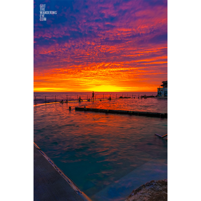 Bronte Beach Oceanpool Sunrise. Red Flames on the horizon at Sydney's iconic swimming pool.